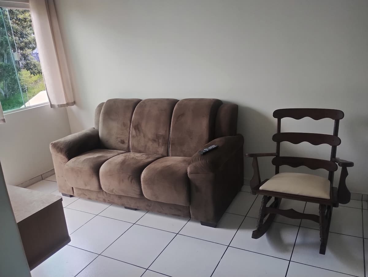 Cantinho da vovó com cadeira de balanço